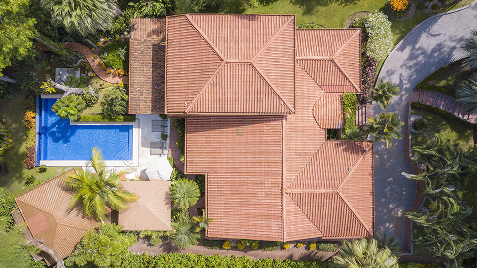 aerial view of Casa Buen Dia with large drive and pool